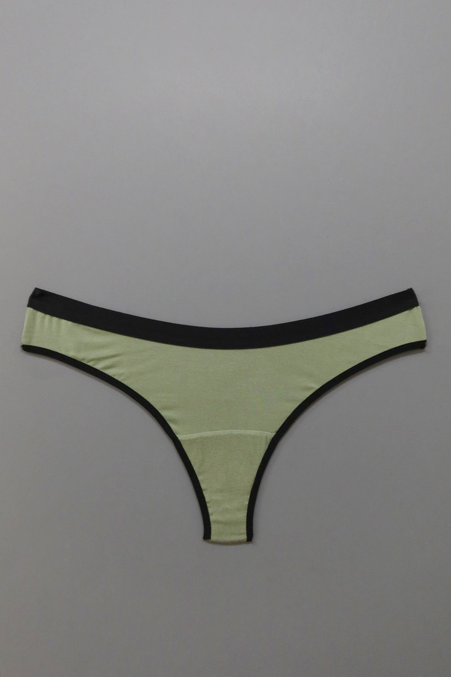 Emery Thong in Solid Sage - MARY YOUNG