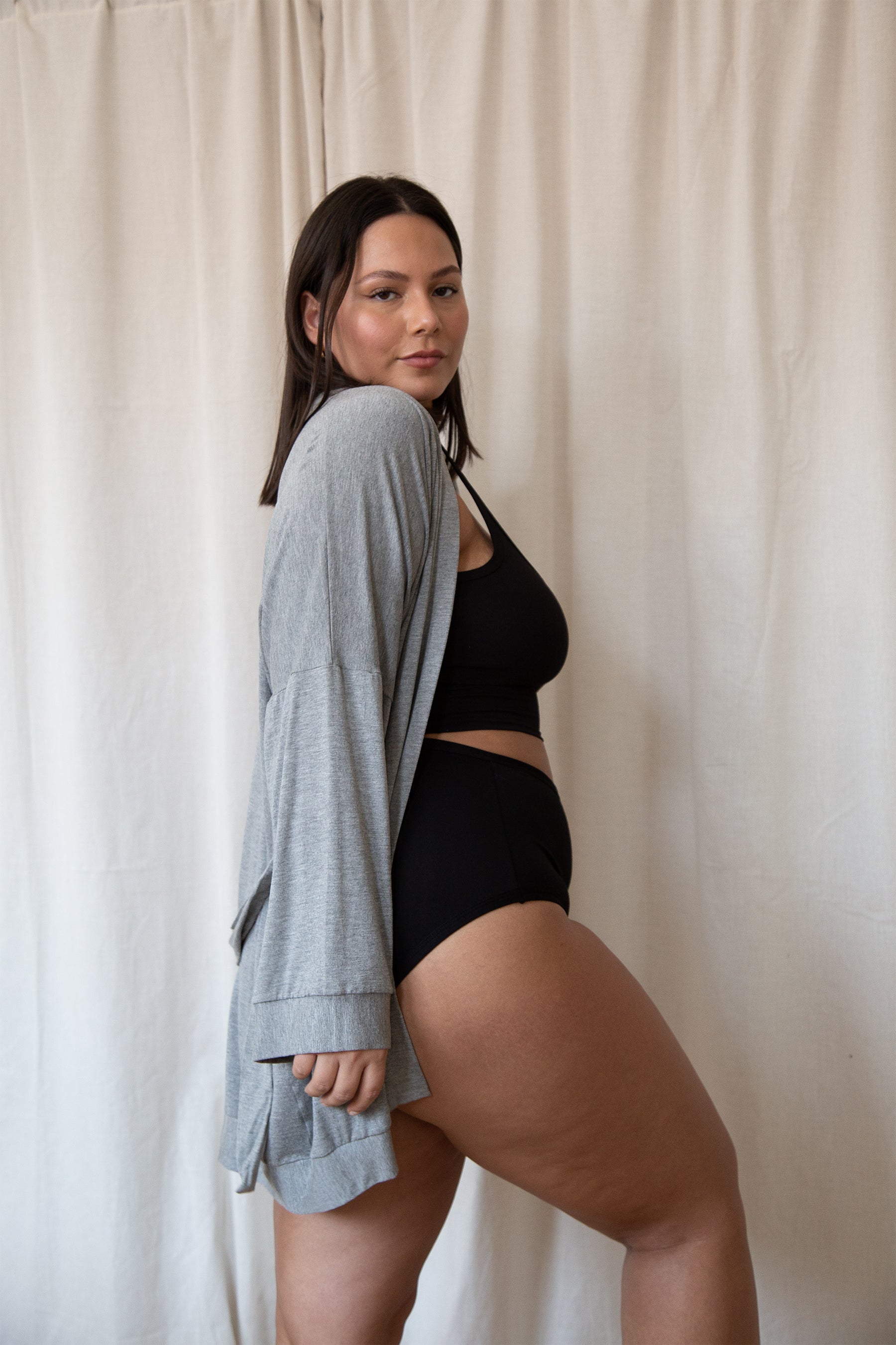 model wears grey soft robe and comfortable lounge set